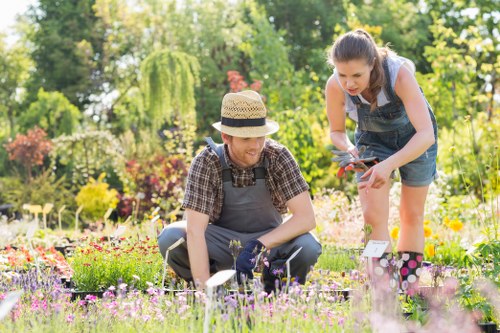 Landscape team preparing a garden service booking