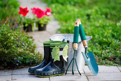 Workers reviewing ethical labour compliance documents for landscaping operations