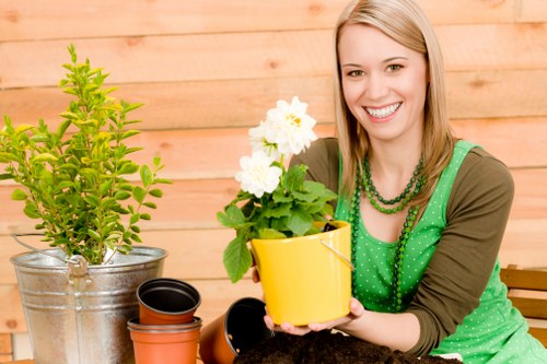 Trained landscaper reviewing site safety procedures